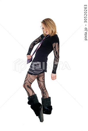 Funny punk girl in bodysuit and boots. 30520263