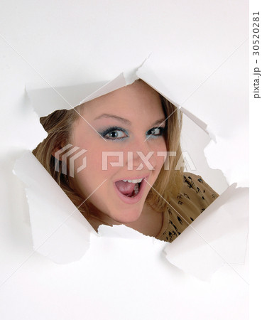 Beautiful woman looking through hole. Beautiful woman looking through hole. 30520281