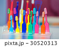Toothbrushes of different colors 30520313