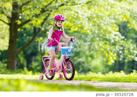 child riding bicycle