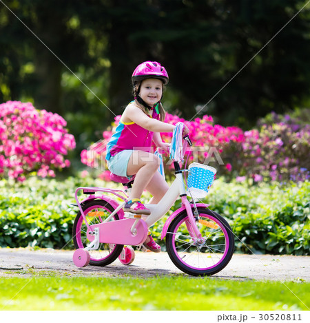Child riding bike. Kid on bicycle. Child riding bike. Kid on bicycle. 30520811