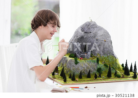 School student working on model building project 30521138