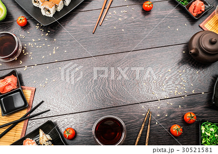 Sushi set sashimi and sushi rolls around table 30521581
