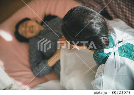 woman during pregnancy or shortly after childbirth 30523073