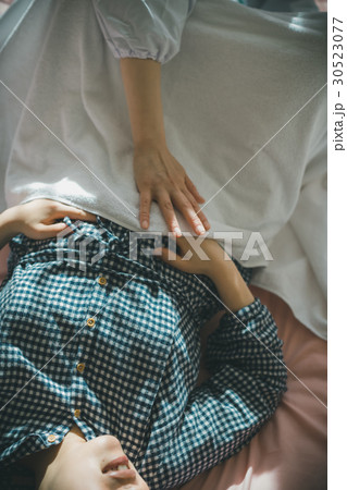 woman during pregnancy or shortly after childbirth woman during pregnancy or shortly after childbirth 30523077