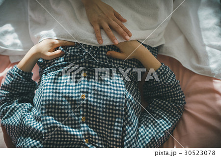 woman during pregnancy or shortly after childbirth 30523078