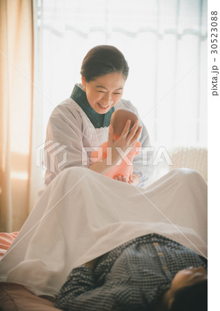 woman during pregnancy or shortly after childbirth 30523088