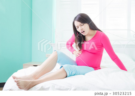 pregnancy woman feel pain 30523215