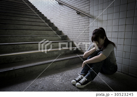 depressed woman in underground depressed woman in underground 30523245