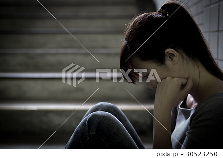 depressed woman in underground 30523250