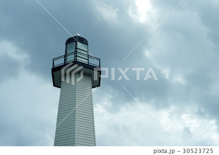 stormy sky over lighthouse 30523725