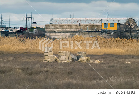 Building materials on field near the base 30524393