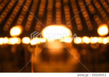 Blurred candle to pay respect to lord buddha Blurred candle to pay respect to lord buddha 30526451