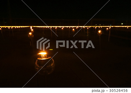 Closeup candle to pay respect to lord buddha 30526456