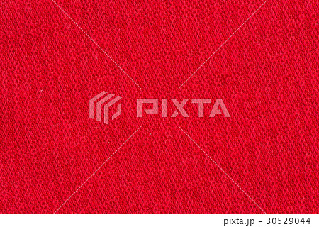 Red fabric canvas macro shot texture or background 30529044