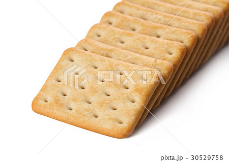 row of biscuits on white 30529758