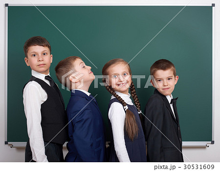 elementary school boy near blank chalkboard elementary school boy near blank chalkboard 30531609