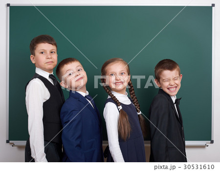 elementary school boy near blank chalkboard elementary school boy near blank chalkboard 30531610