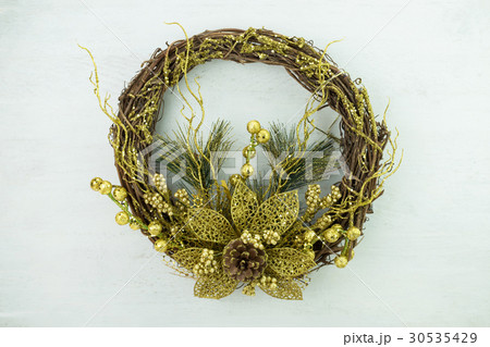 Christmas wreath on white wood background 30535429