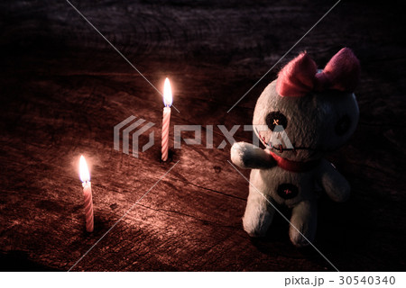 Vintage evil spooky doll with light of candle 30540340