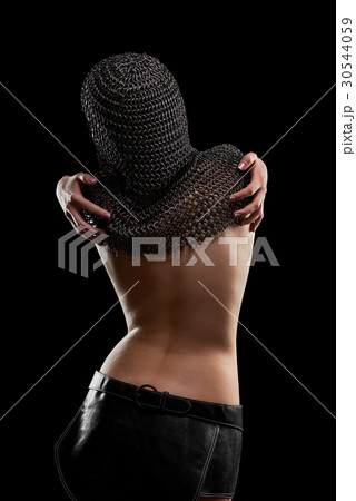Naked sexy young woman wearing chain mail  30544059