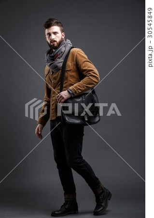 Stylish man with black leather bag 30545849