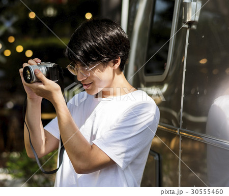 Young asian boy holiday leisure taking photo Young asian boy holiday leisure taking photo 30555460