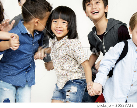 Group of kids celebrate party fun together 30557728