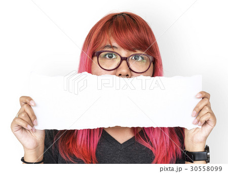 Young adult asian girl holding balnk paper cover her mouth Young adult asian girl holding balnk paper cover her mouth 30558099