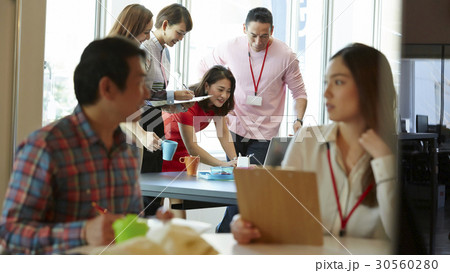 A team is discussing. A team is discussing. 30560280