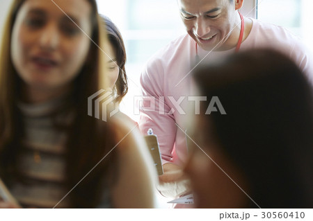 A man and some people at work 30560410