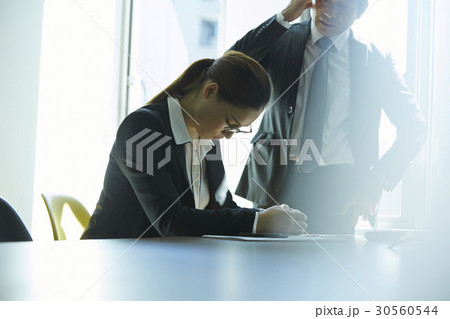 A stressed businesswoman in office A stressed businesswoman in office 30560544