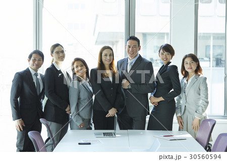 A portrait of a successful business team in office. 30560594
