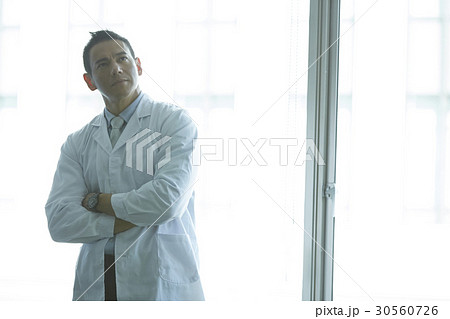 a portrait of a man folding his arms and thinking a portrait of a man folding his arms and thinking 30560726