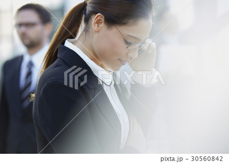 a portrait of a woman looking down a portrait of a woman looking down 30560842