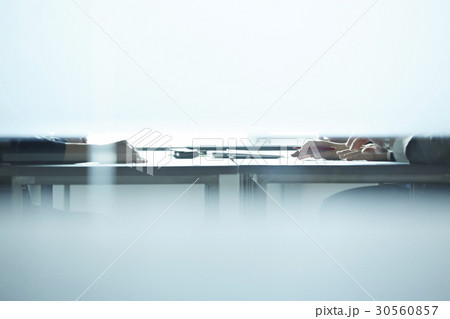 an unclear portrait of some people working 30560857