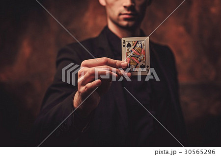 Man showing tricks with cards Man showing tricks with cards 30565296