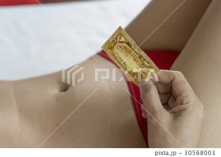Nudity women with condom packet Nudity women with condom packet 30568003