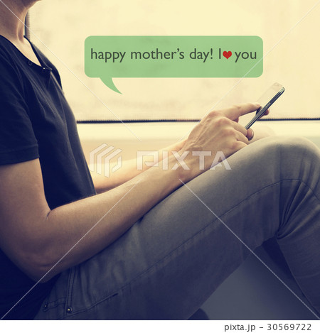 young man congratulating his mother 30569722