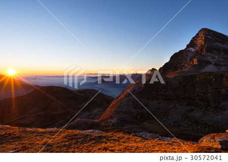 Mountain range at sunset Mountain range at sunset 30572041