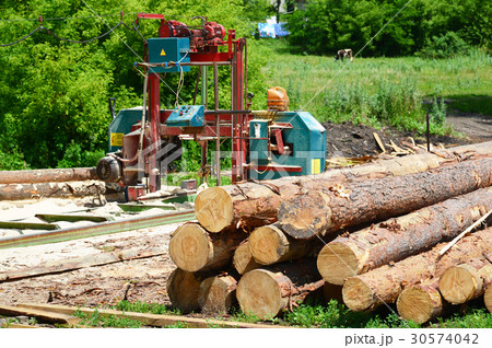 Small sawmill in open air, Russia Small sawmill in open air, Russia 30574042