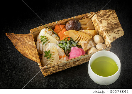 お弁当　Lunch box of a bamboo shoot and rice ball 30578342
