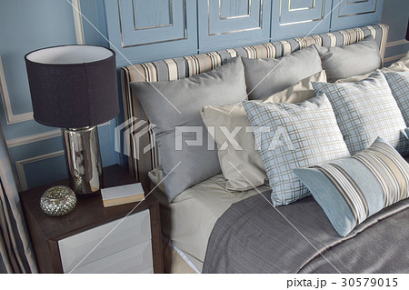 Light blue pillows in classic style bedding 30579015