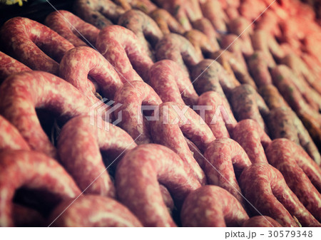 Raw sausage on counter Raw sausage on counter 30579348