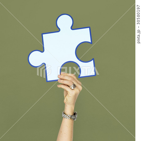 Human Hand Holding Puzzle Piece Human Hand Holding Puzzle Piece 30580197