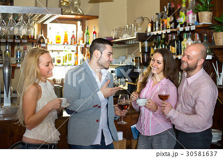 Young adults in bar Young adults in bar 30581637