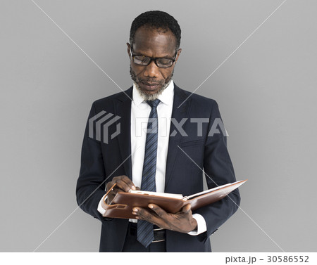 African Descent Business Man Notebook Portrait 30586552