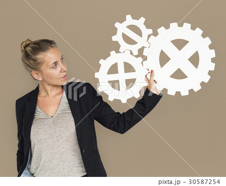 Businesswoman Holding Gear Symbol Connection Concept 30587254