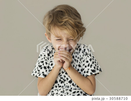A little boy is laughing 30588710