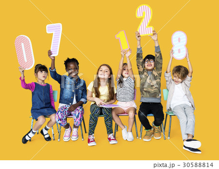 A group of children are holding a number A group of children are holding a number 30588814